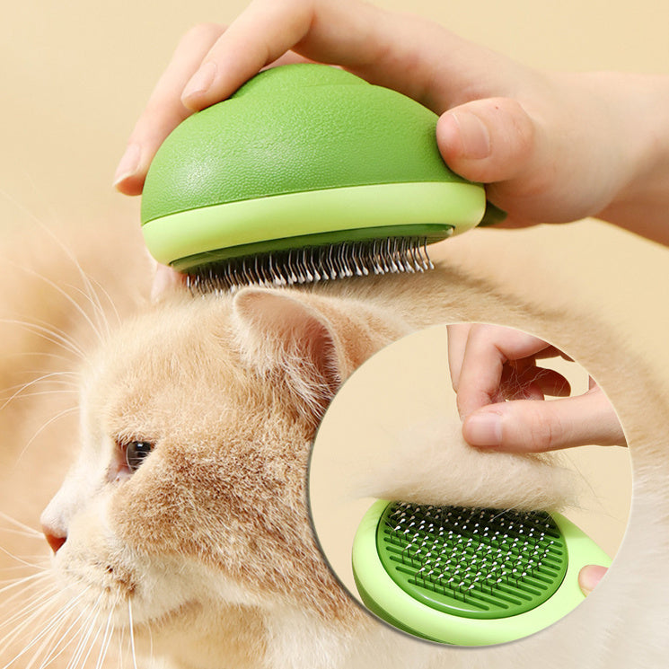 Cepillo para gatos con forma de aguacate, hecho en acero inoxidable con botón de limpieza.