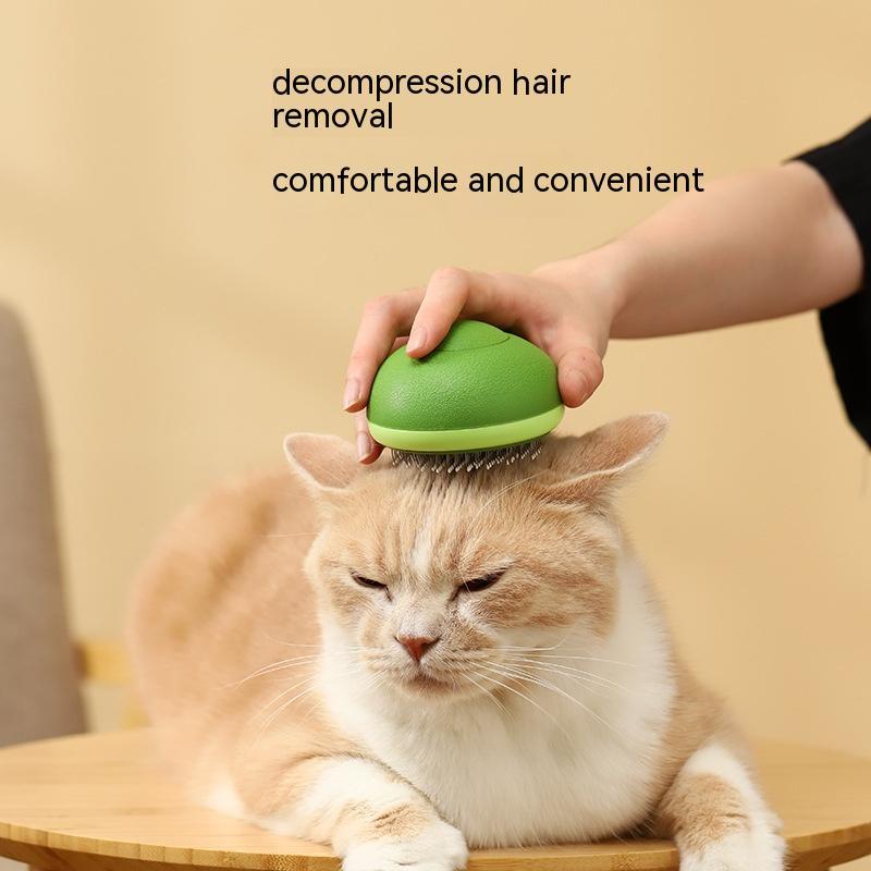Cepillo para gatos con forma de aguacate, hecho en acero inoxidable con botón de limpieza.