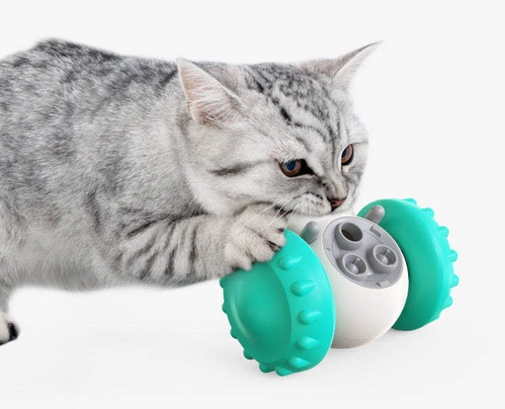 Juguete dispensador de comida para gatos y perros, muy divertido.